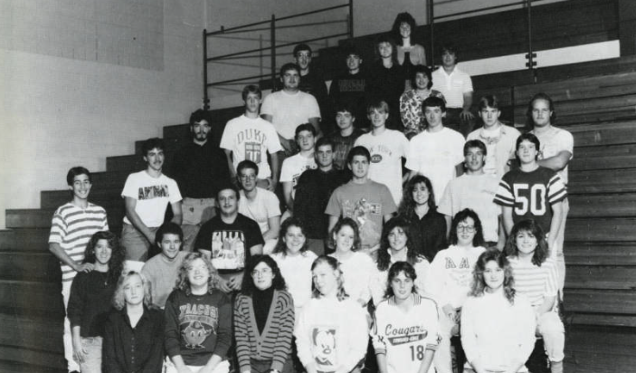 black and white image of students in the gym during the 1991-92 school year
