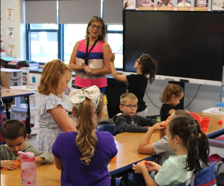 elementary students at Edwards-Knox speak to their teacher