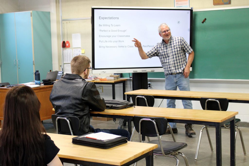 high school students at Edwards-Knox listen to their teacher