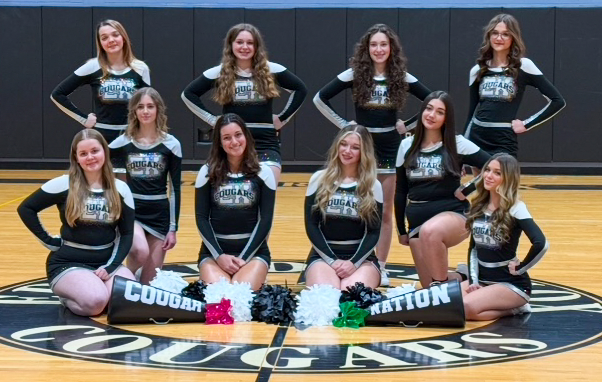 cheerleaders posing for photo