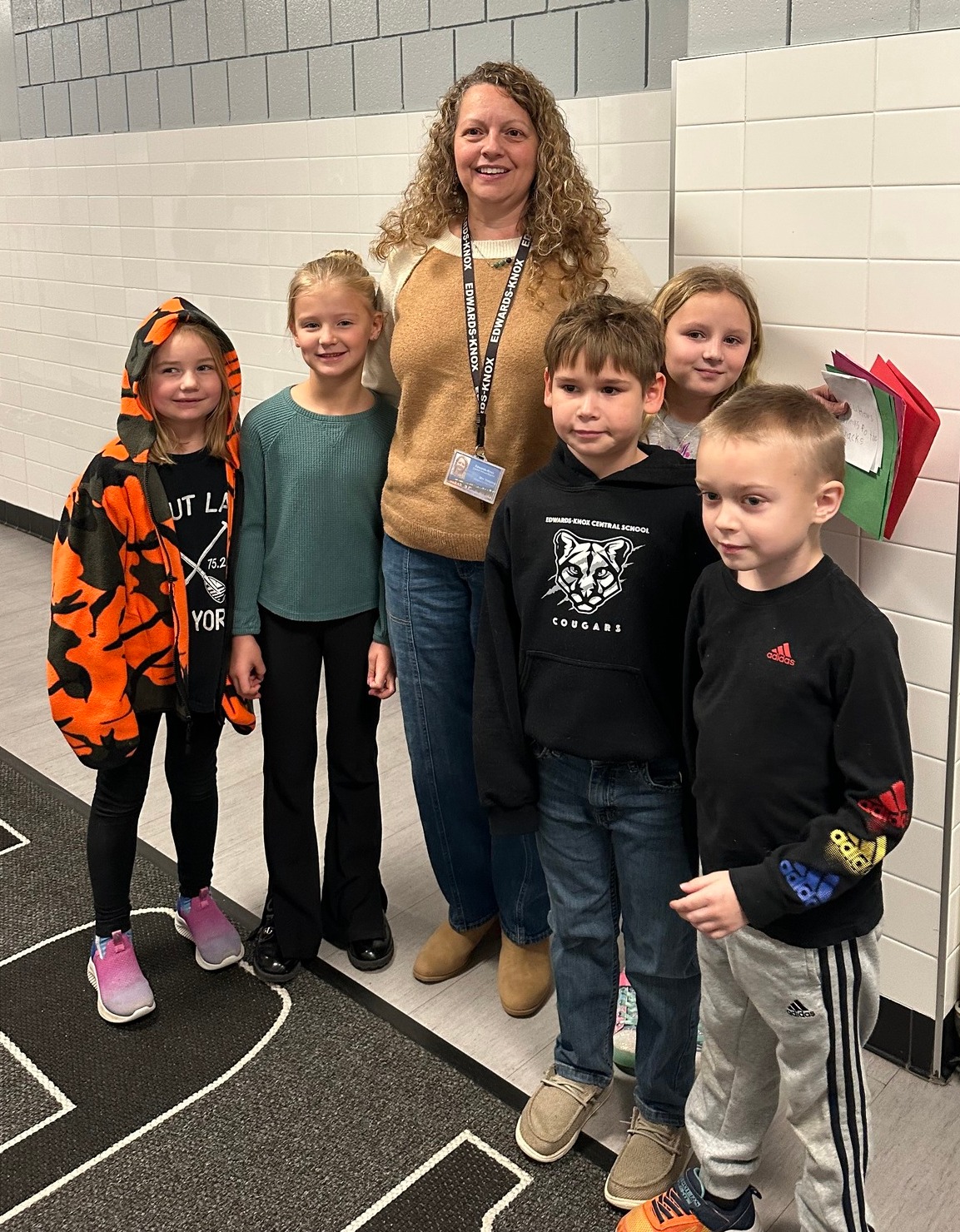 teacher with young students