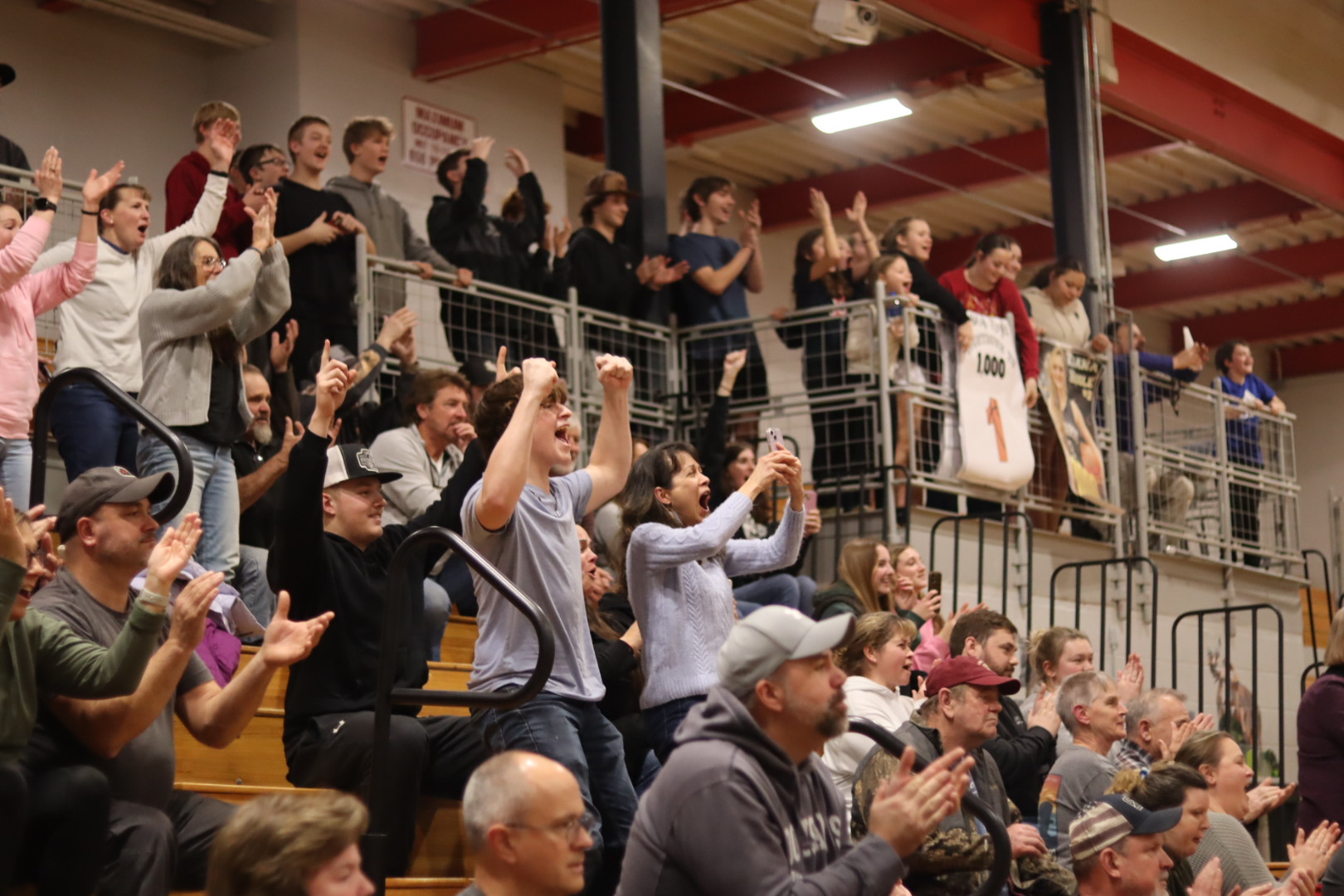parents/family members and students cheering