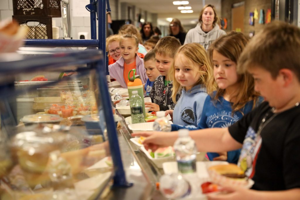 Several students in the lunch line at school