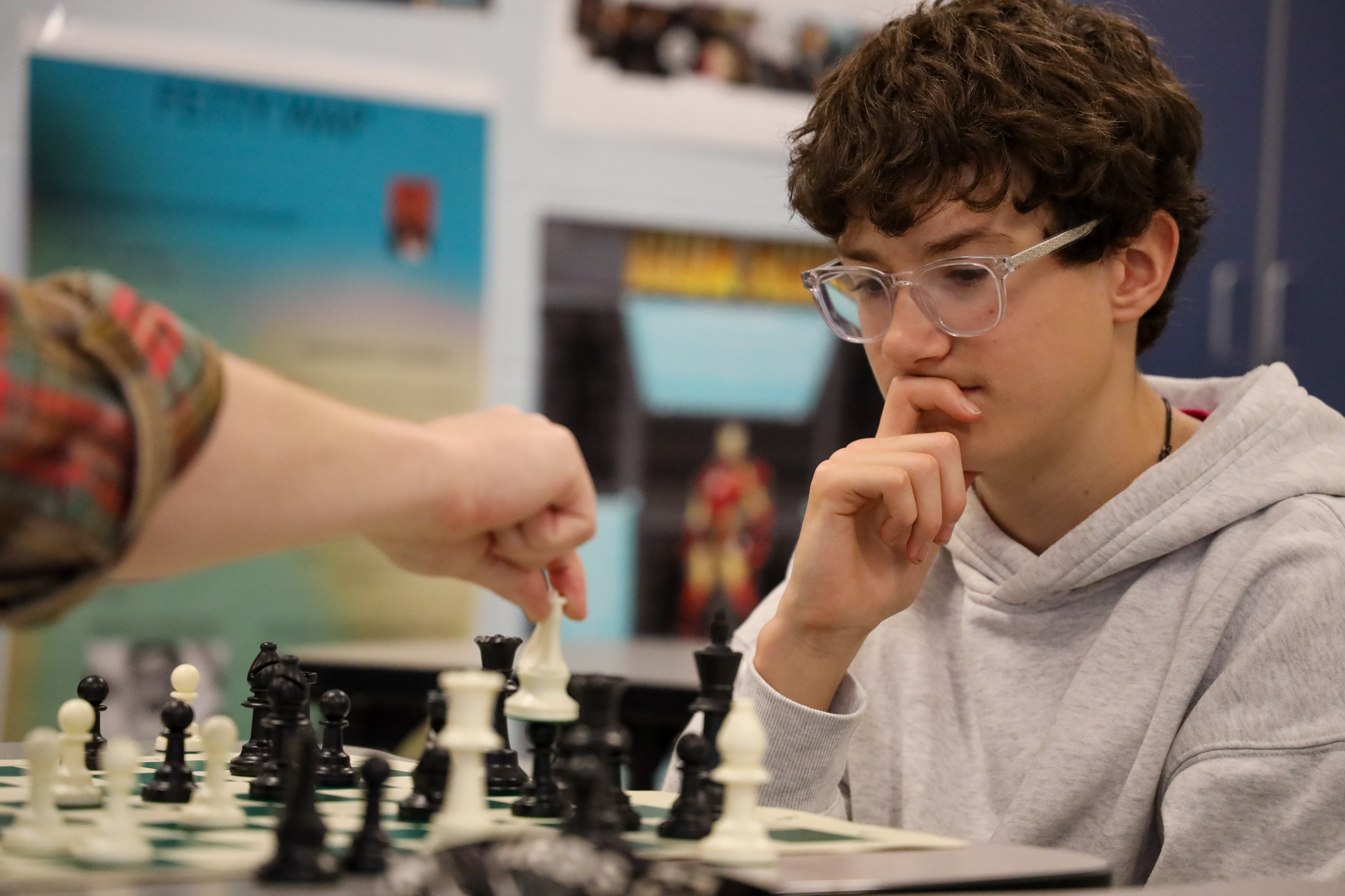 A student playing chess