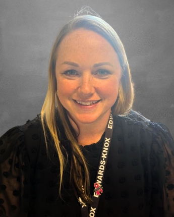 A woman smiling for a photo