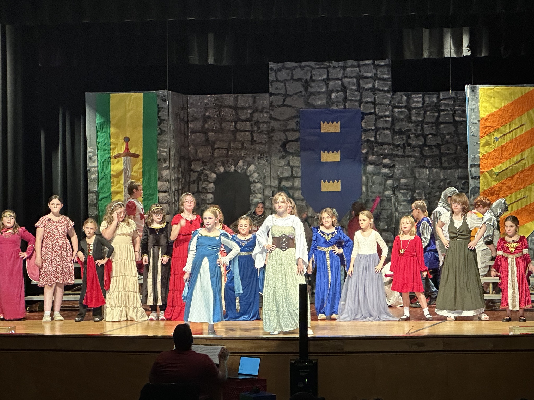 Group of students on stage performing