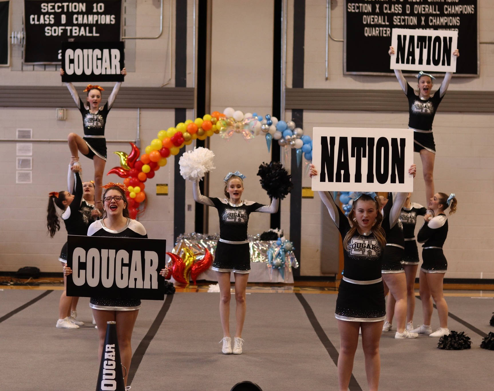 Small group of female cheerleaders during a competition